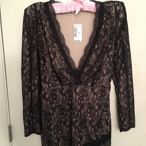 Super cute black lace dress with nude lining